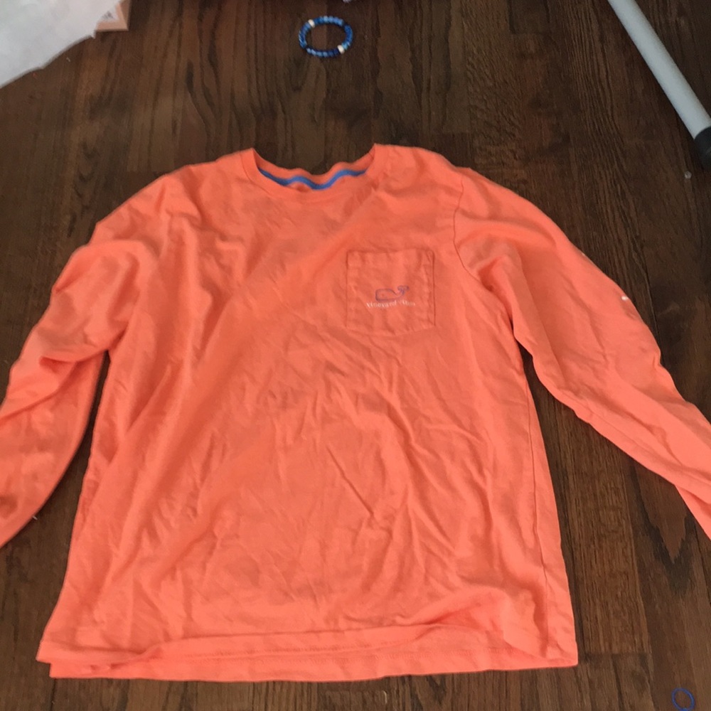 A pink long sleeve shirt